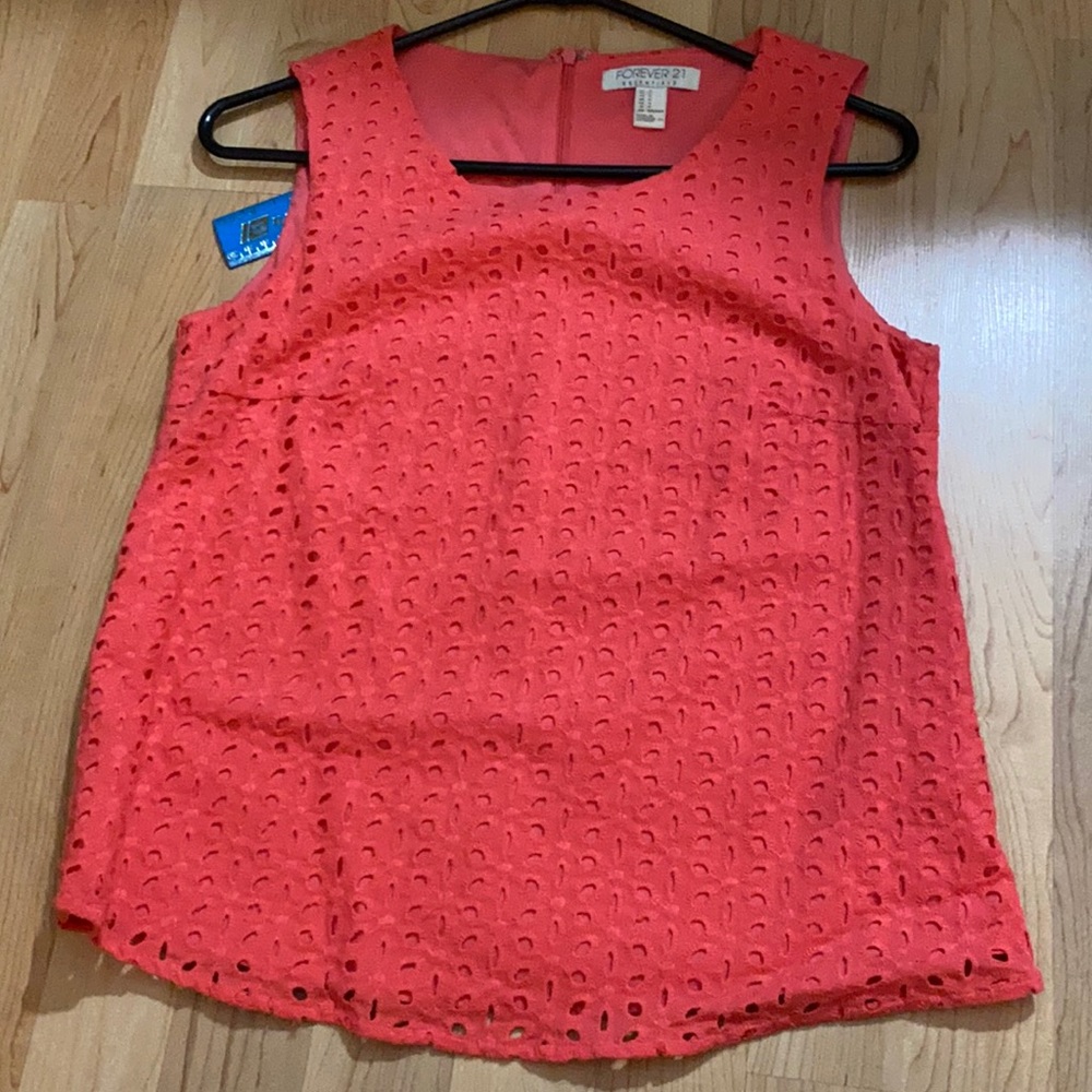 Coral sleeveless blouse